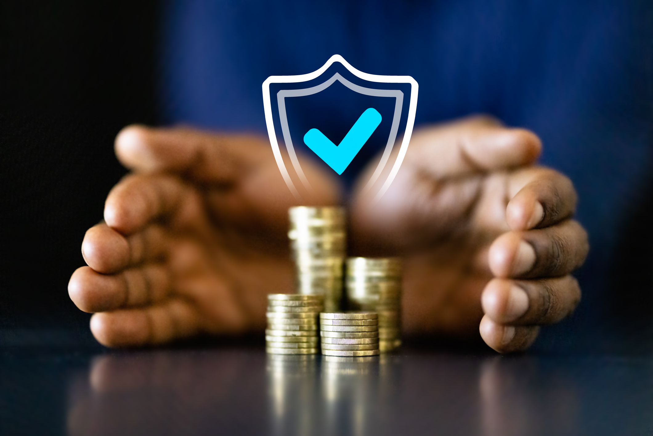 African American businessman counting coins to protect income and invest African American businessman counting coins to protect income and invest